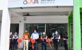Ribbon Cutting Ceremony - From Left Eddie Pool, COO Eric Kiu Kwong Seng of SOP and CEO Dr Dayna Pool of Healthy Strides Foundation.